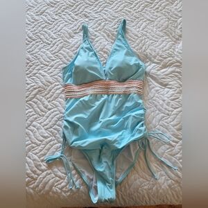 Light Blue One-Piece Swimsuit with Pink and White Accents
